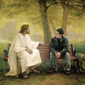 jesus sitting on bench with teenage boy dressed in black